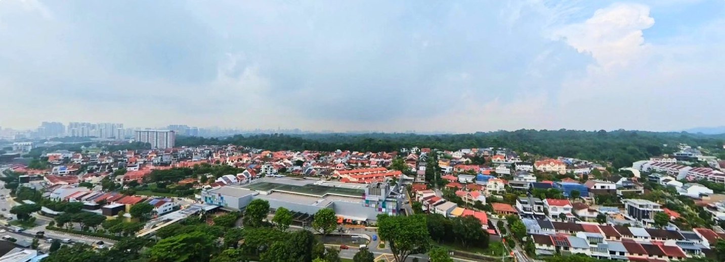 Panoramic view from Thomson Reserve over the landed Thomson estate and Central Catchment greenery towards the city skyline